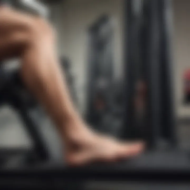 An individual evaluating the price tags of different leg press machines in a showroom.