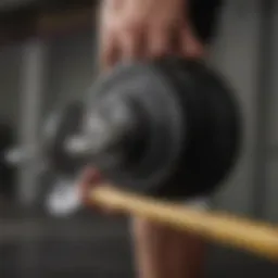 Detailed view of Planet Fitness barbell showcasing its grip and finish