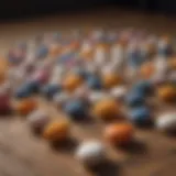 A close-up of an assortment of erection pills on a wooden table.