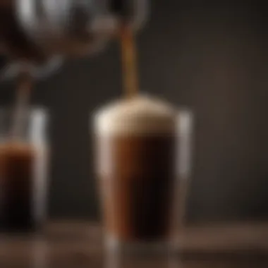 A close-up view of a frothy nitro cold brew coffee poured into a glass.