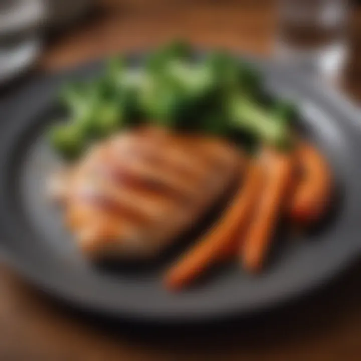 A beautiful plate of grilled chicken breast with steamed broccoli and carrots