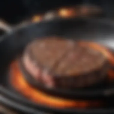 Steak sizzling in a frying pan