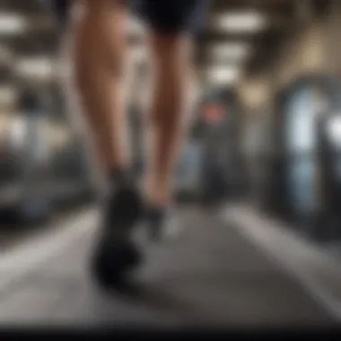 Person walking on a treadmill in a gym setting